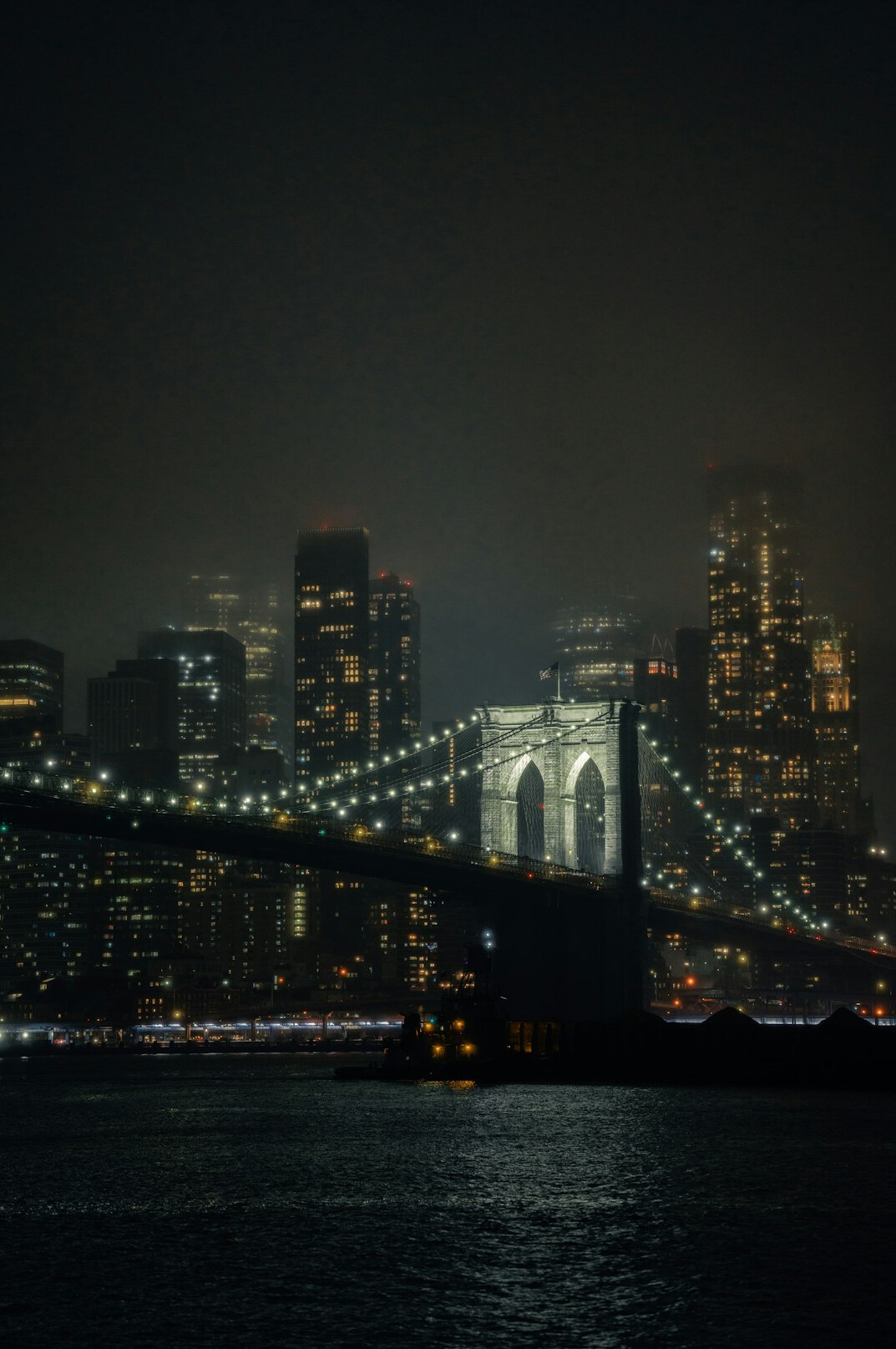 foggy city street at night